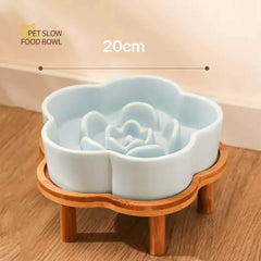 Petroom light blue ceramic flower-shaped slow feeder bowl on a wooden stand