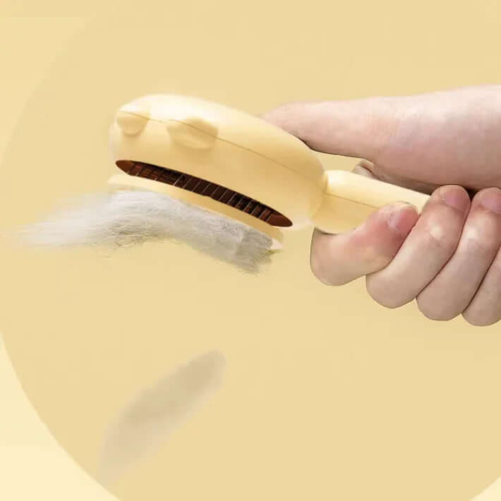 Hand using a yellow hair removal device on a beige background