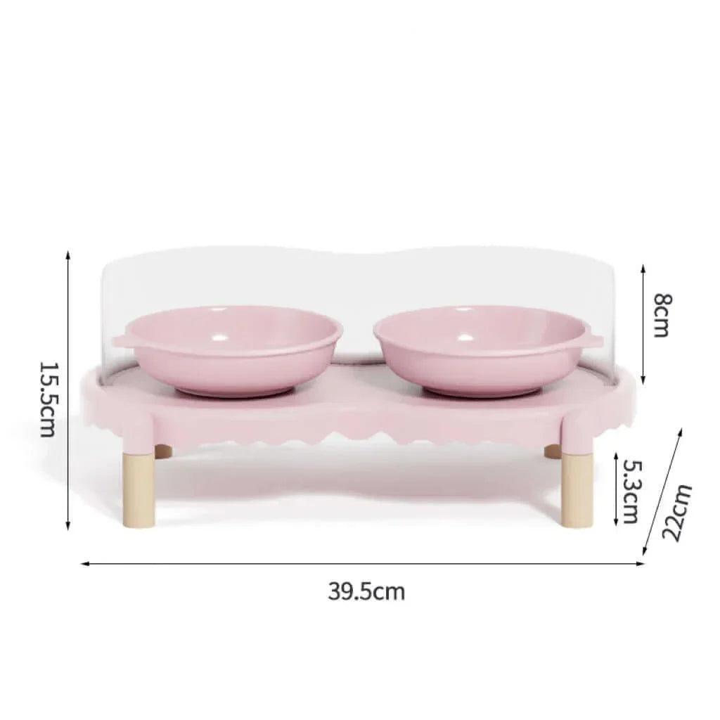 Pink elevated pet feeder with two bowls, wooden legs, and dimensions shown for cats and dogs