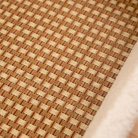 Close-up of woven mat with brown and beige colors