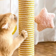 Ginger cat playing with yellow and white striped scratching post and pink star toy