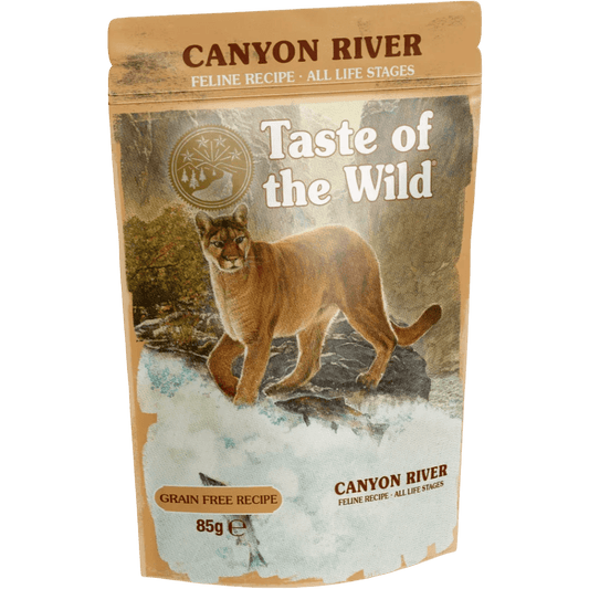 Taste of the Wild Grain-Free Canyon River Feline Recipe - Chunks in Gravy 85g x 12 Pack packaging with mountain backdrop.