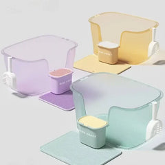 Pastel cat litter boxes with matching scoops and mats, stylish pet supplies for modern homes