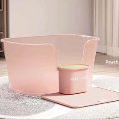 Peach-colored pet bathtub with matching Wink Honey scoop and mat, stylish cat & dog grooming set