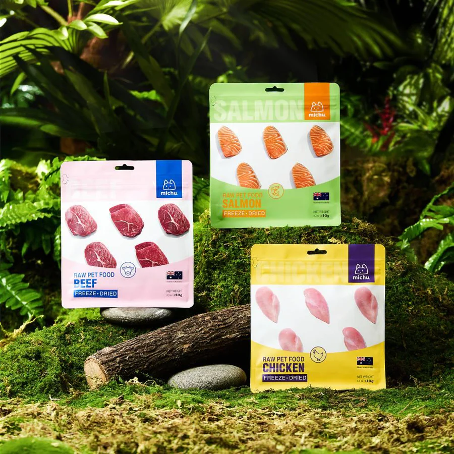Michu Freeze-Dried Raw Pet Food Dog & Cat Treat 150g - Made in Australia packs displayed among greenery.
