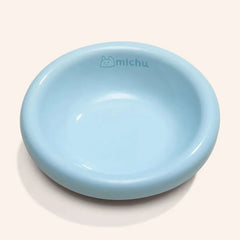 Michu Wide and Shallow Ceramic Pet Bowl in soft blue color, designed to prevent whisker fatigue for cats.
