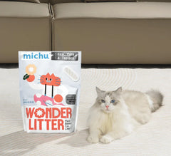 Michu Wonder Litter - Automatic Litter Box Solution 2.5kg/6L with a cat and litter package on a rug.