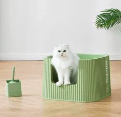 Michu XXL Deluxe Cat Litter Box with a white cat sitting inside, accompanied by a large scoop.