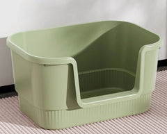 Sage green high-sided cat litter box with entry ramp, ideal for indoor pet care and mess-free use.