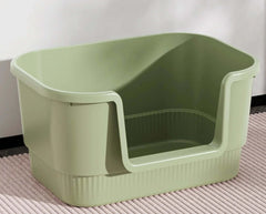Sage green high-sided cat litter box with entry ramp, ideal for indoor pet care and mess-free use.