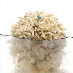 Cat litter pellets absorbing water, showing clumping and odor control for cats