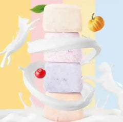 Colorful pet treats stacked with milk splash, pumpkin, and berry, perfect for cats and dogs