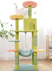 White cat on a Petroom 154cm multi-level aesthetic cat tower with sisal posts.