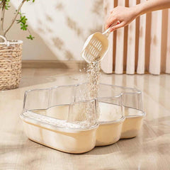 Transparent Semi-Enclosed Large Cat Litter Tray with Scoop being filled with litter for a clean cat environment.