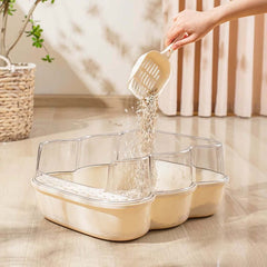 Transparent Semi-Enclosed Large Cat Litter Tray with Scoop being filled with litter for a clean cat environment.