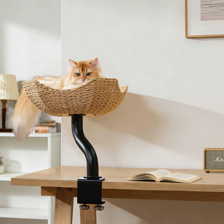 Michu DeskMate Desk-Mounted Cat Tree Perfect For WFH with a cat lounging comfortably in a woven perch.