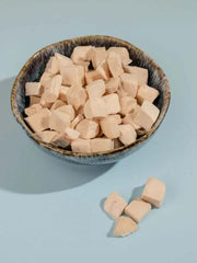 Bowl of PawDry Freeze-Dried Chicken Bites Pets Treat 100g for dogs and cats, high-protein, grain-free snacks.