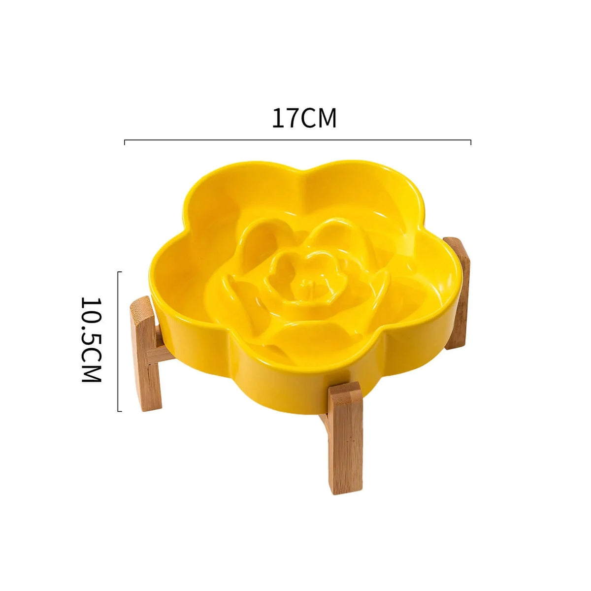 Yellow ceramic flower-shaped slow feeder bowl for cats and dogs on a wooden stand