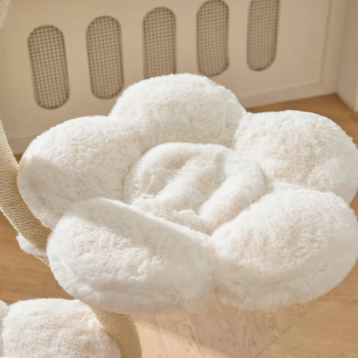 Close-up of a white flower-shaped plush platform on a Michu fairy cat tower.