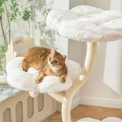 An orange tabby cat relaxing on a Michu 4-tier white flower-shaped designer cat tree.