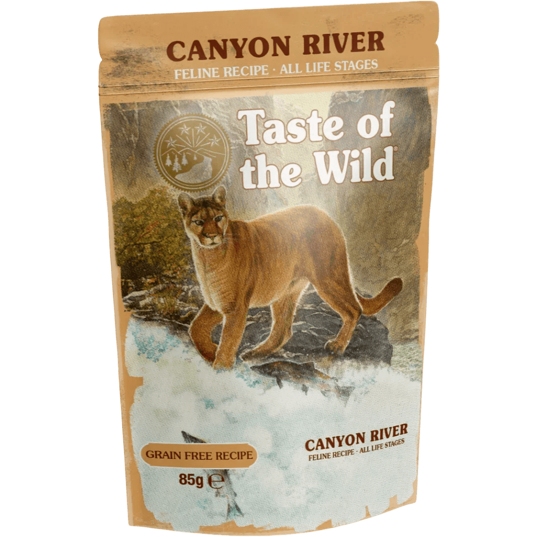 Taste of the Wild Grain-Free Canyon River Feline Recipe - Chunks in Gravy 85g x 12 Pack packaging with mountain backdrop.