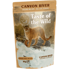 Taste of the Wild Grain-Free Canyon River Feline Recipe - Chunks in Gravy 85g x 12 Pack packaging with mountain backdrop.