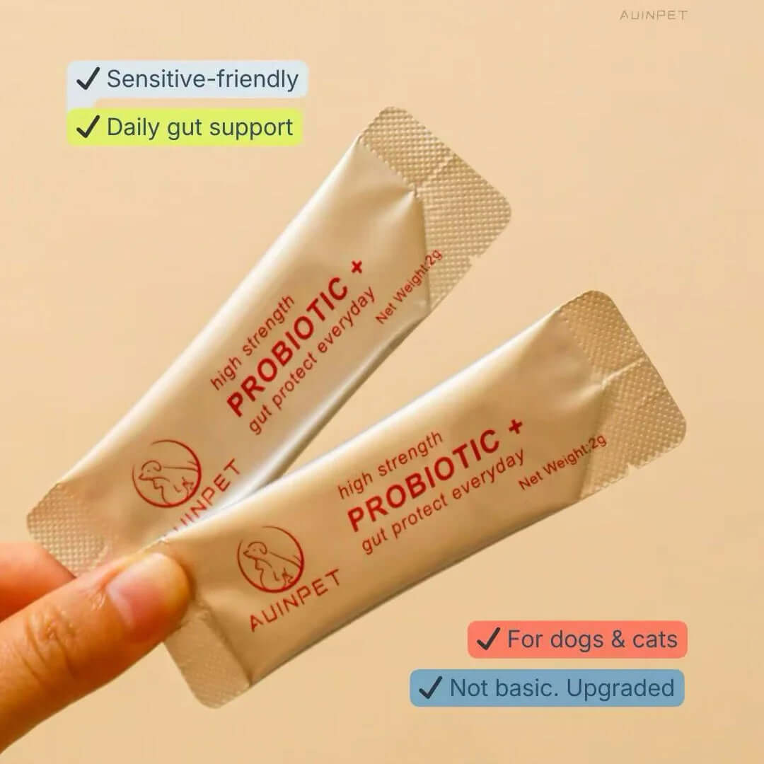 Two packets of AUNPET probiotic supplement for pets on a beige background