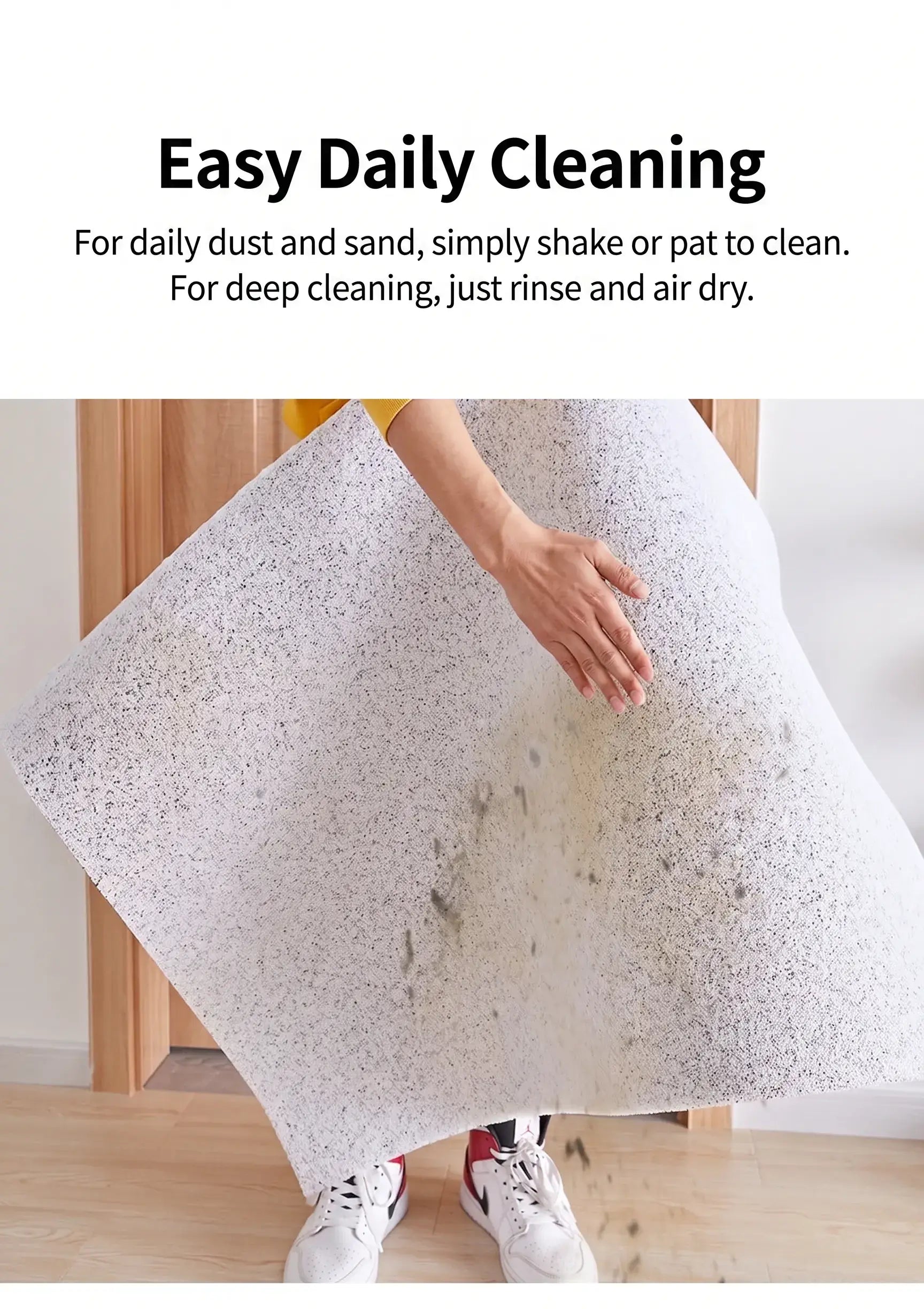 Non-Slip Easy Clean PVC Cat Litter Mat Pink being shaken for easy cleaning, demonstrating simple maintenance.