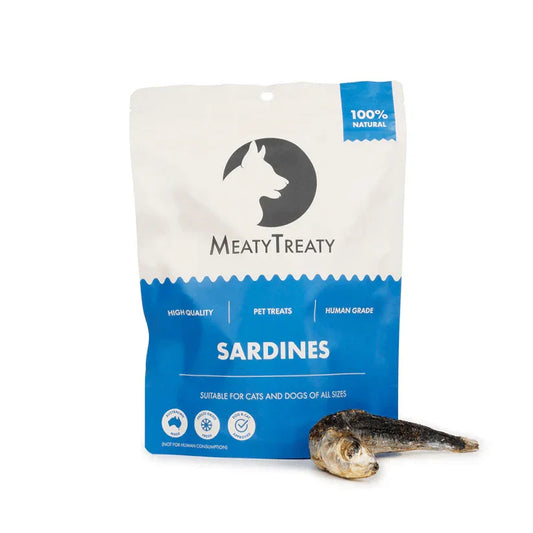 Meaty Treaty Whole Sardine freeze dried dog and cat treats 100g package with whole sardine beside it.