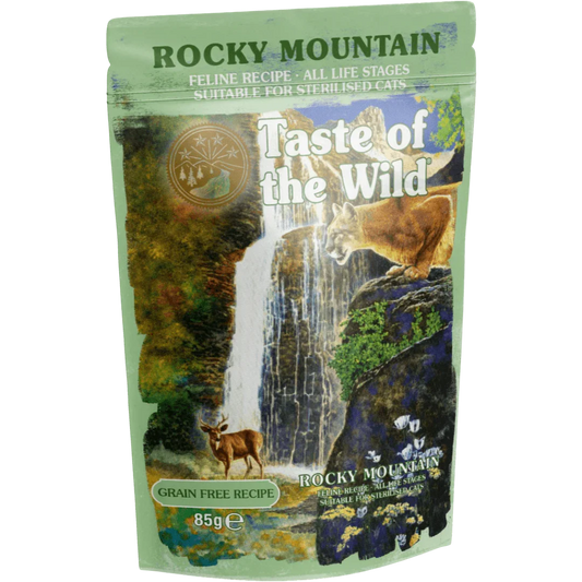 Taste of the Wild Grain-Free Rocky Mountain Feline Recipe - Chunks in Gravy 85g x 12 Pack - Cat food pouch with waterfall background.
